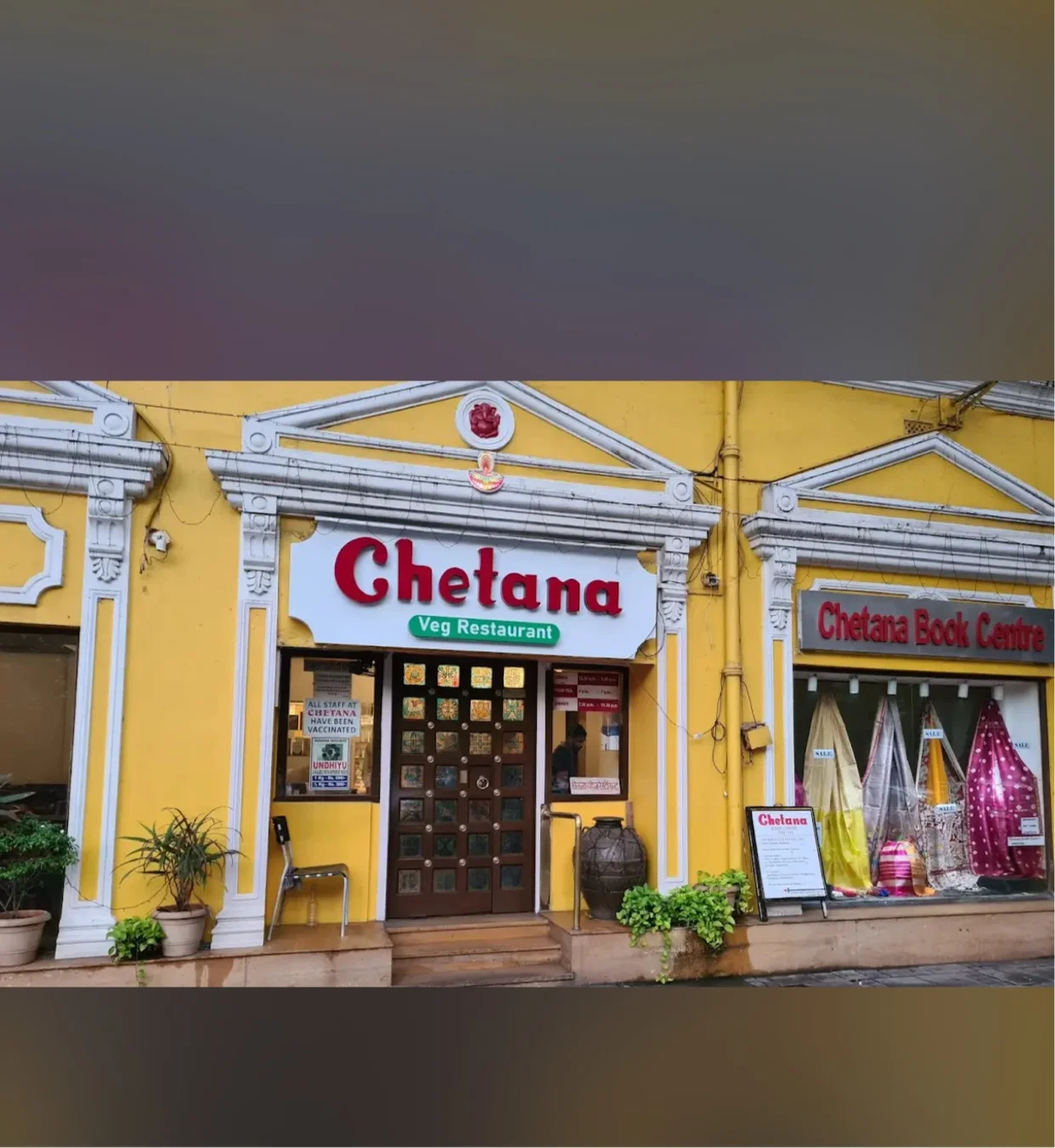 Street frontage and signage of Chetana Veg Restaurant at Kala Ghoda, Mumbai