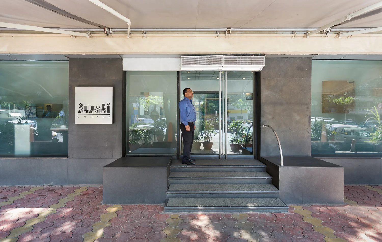 Entrance and glass frontage of Swati Snacks in Tardeo, Mumbai